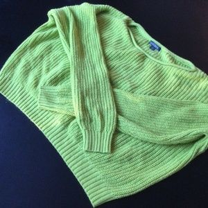 A lime green sweater